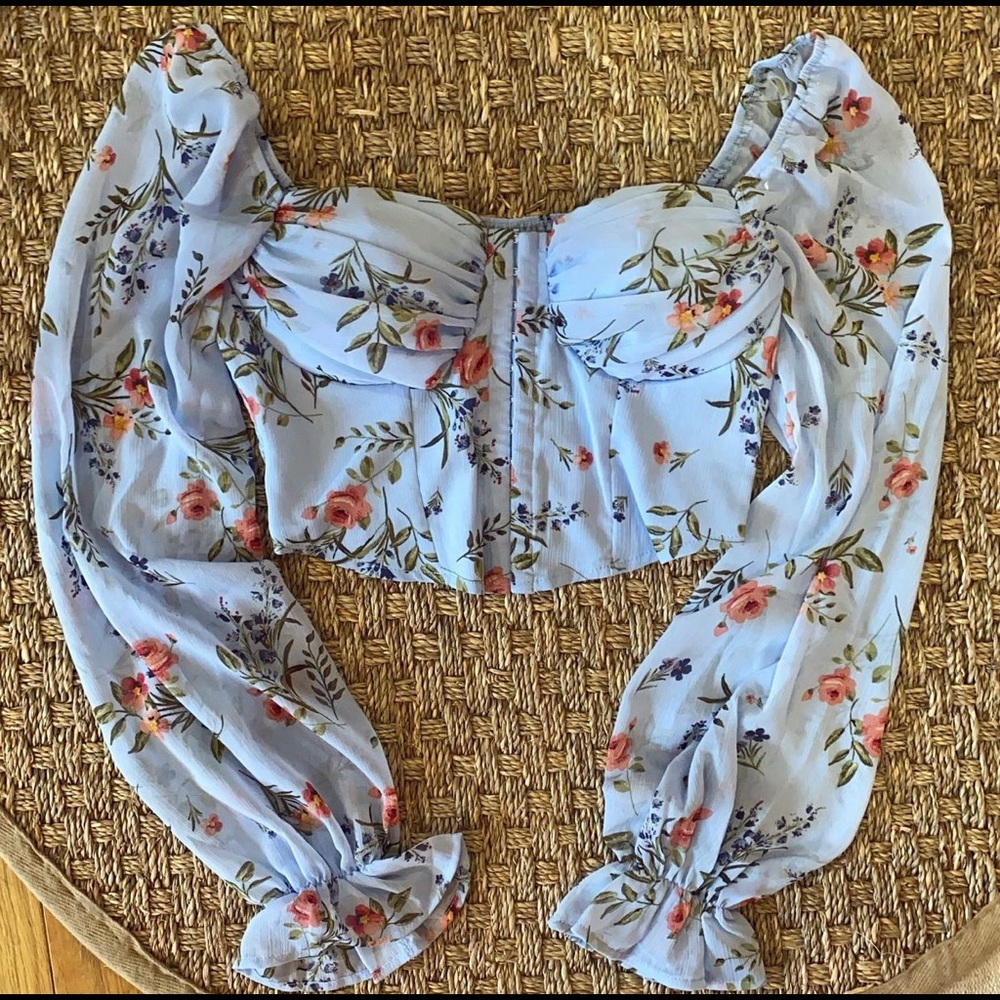 Blue floral cropped top with built in cups and hook and eye front closure